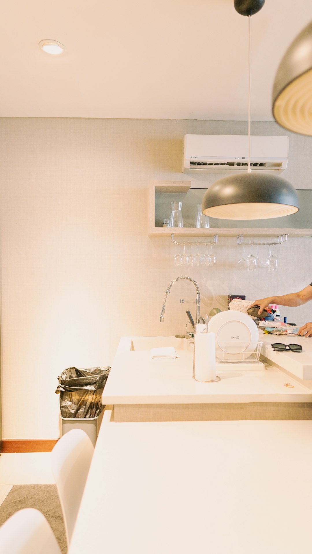 woman cleaning kitchen counter